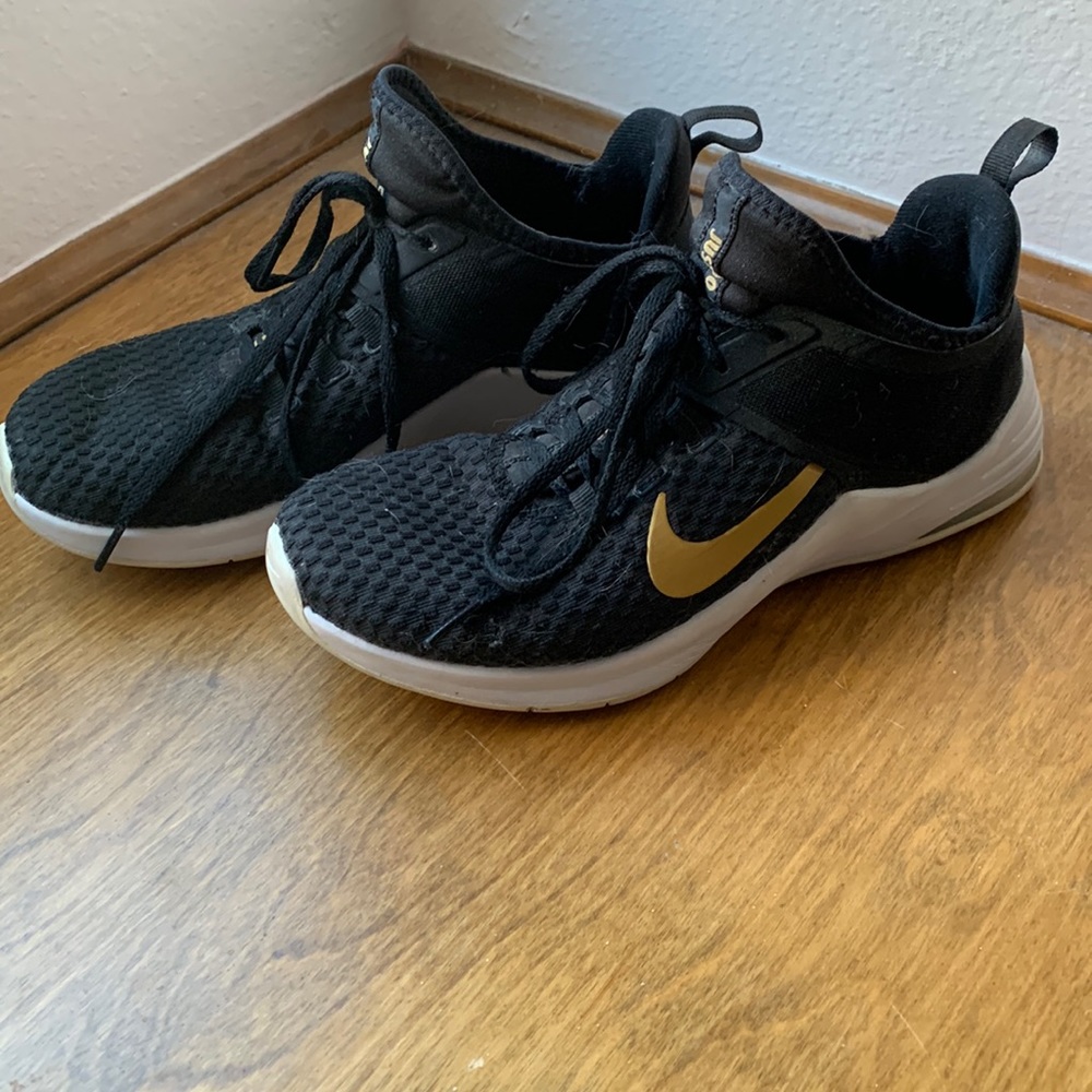 Black and Gold Nike Shoe Woman’s size 8